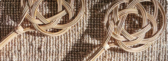 Sisalteppich mit Teppichklopfer