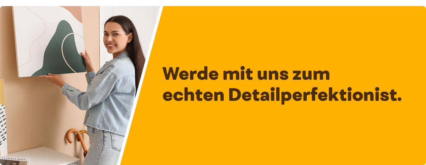 Auszubildende hängt ein Bild an die Wand. Text Werde mit uns zum echten Detailperfektionist.