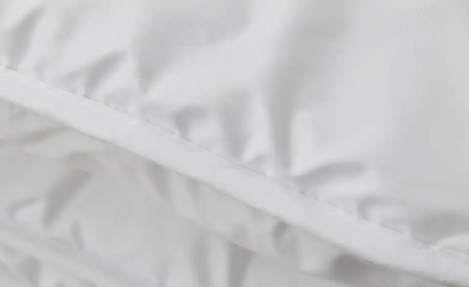 John Cotton Duo-Steppbett Royal, Naht