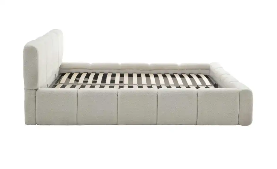 Polsterbett in cremefarbenem Bouclé, Profilansicht