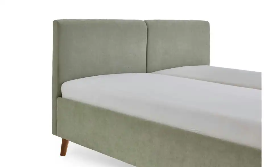 Polsterbett in hellgrün, Detailansicht
