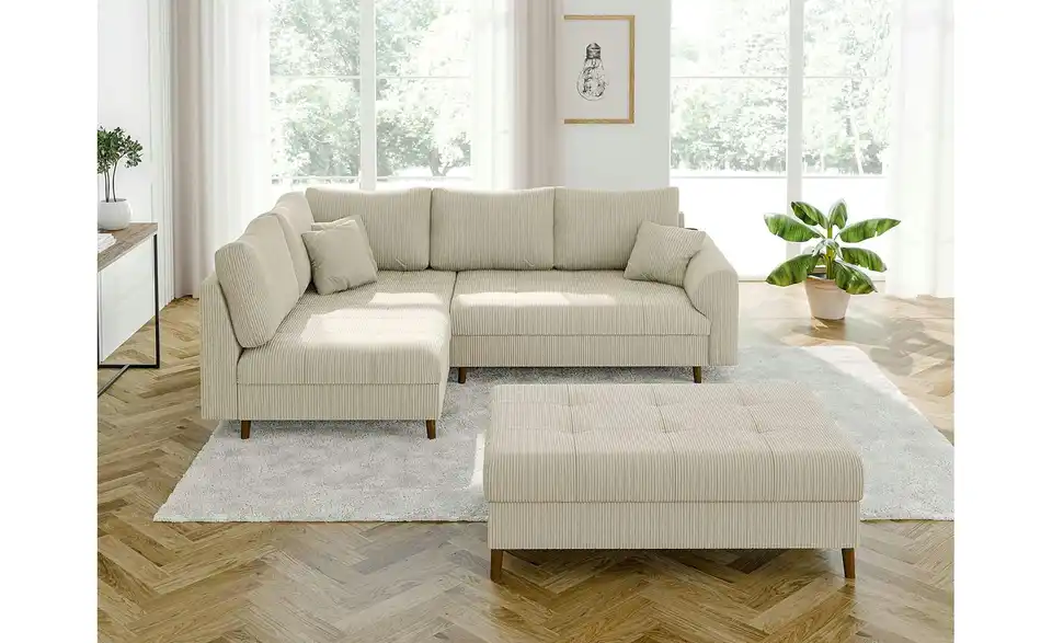 Ecksofa mit Hocker, in Wohnsituation