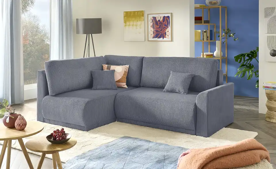 Ecksofa Malyn mit Schlaffunktion, in Wohnsituation