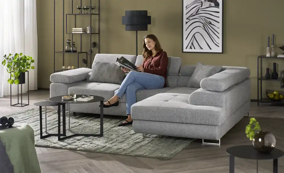 Ecksofa Tereccia mit Schlaffunktion, in Wohnsituation