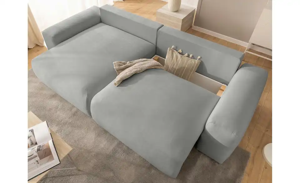 S-STYLE Ecksofa Puffy mit Schlaffunktion, in Wohnsituation
