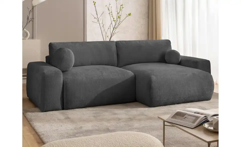 S-STYLE Ecksofa Puffy mit Schlaffunktion, in Wohnsituation