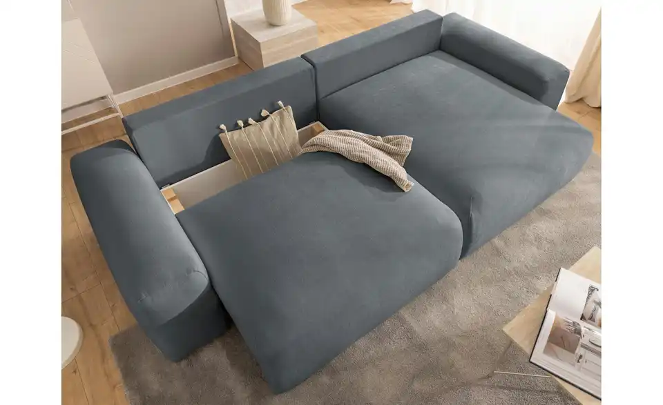 S-STYLE Ecksofa Puffy mit Schlaffunktion, in Wohnsituation