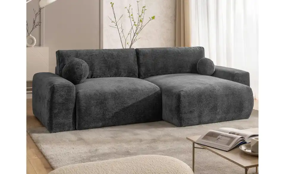 S-STYLE Ecksofa Puffy mit Schlaffunktion, in Wohnsituation