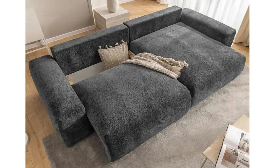 S-STYLE Ecksofa Puffy mit Schlaffunktion, in Wohnsituation