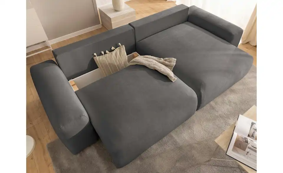 S-STYLE Ecksofa Puffy mit Schlaffunktion, in Wohnsituation
